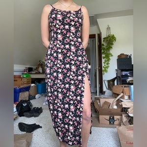 Forever 21 dress size medium. Black with floral print, slit, spaghetti straps